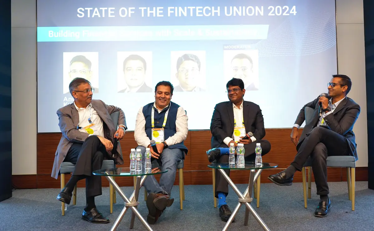 A panel discussion on stage at the State of the Fintech Union 2024 session