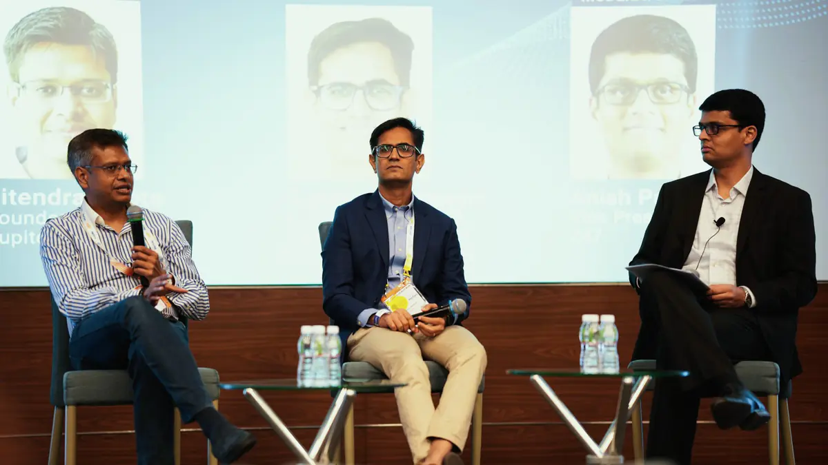 Three panellists on stage at Global Fintech Fest 2024
